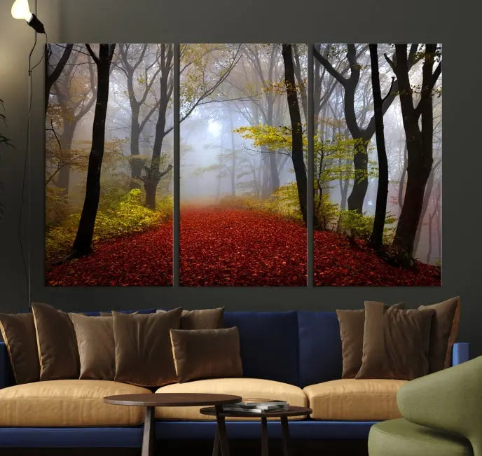 The Foggy Forest Wall Art Landscape Canvas Print beautifully enhances the space. This triptych artwork showcases a misty autumn forest with a red-leafed path, presented on museum-quality canvases with UV-protective coating for enduring allure. Enjoy the added benefit of free shipping on your purchase.