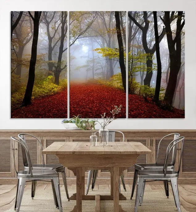 The Foggy Forest Wall Art Landscape Canvas Print beautifully enhances the space. This triptych artwork showcases a misty autumn forest with a red-leafed path, presented on museum-quality canvases with UV-protective coating for enduring allure. Enjoy the added benefit of free shipping on your purchase.