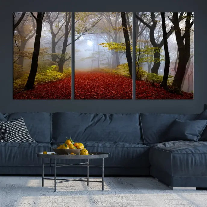 The Foggy Forest Wall Art Landscape Canvas Print beautifully enhances the space. This triptych artwork showcases a misty autumn forest with a red-leafed path, presented on museum-quality canvases with UV-protective coating for enduring allure. Enjoy the added benefit of free shipping on your purchase.