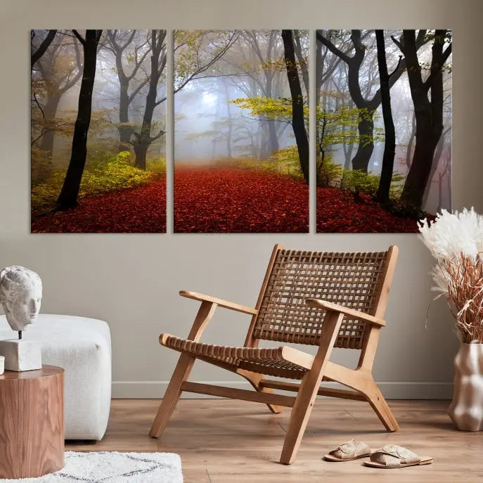 The Foggy Forest Wall Art Landscape Canvas Print beautifully enhances the space. This triptych artwork showcases a misty autumn forest with a red-leafed path, presented on museum-quality canvases with UV-protective coating for enduring allure. Enjoy the added benefit of free shipping on your purchase.