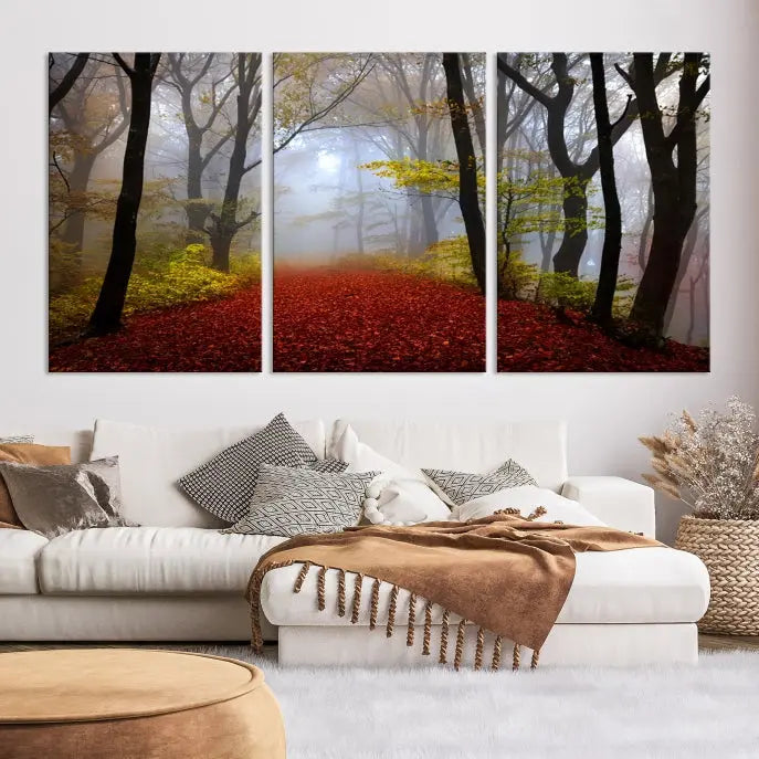 The Foggy Forest Wall Art Landscape Canvas Print beautifully enhances the space. This triptych artwork showcases a misty autumn forest with a red-leafed path, presented on museum-quality canvases with UV-protective coating for enduring allure. Enjoy the added benefit of free shipping on your purchase.