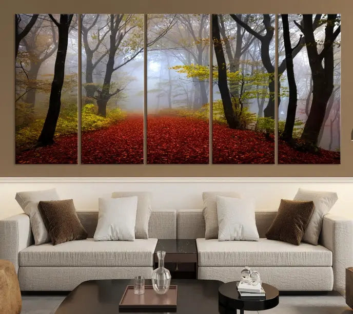 The Foggy Forest Wall Art Landscape Canvas Print beautifully enhances the space. This triptych artwork showcases a misty autumn forest with a red-leafed path, presented on museum-quality canvases with UV-protective coating for enduring allure. Enjoy the added benefit of free shipping on your purchase.