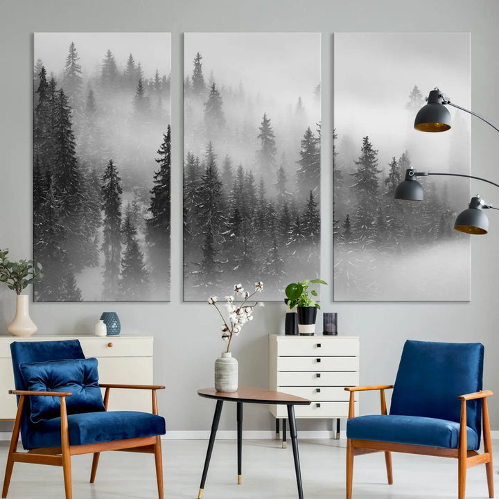 The living room showcases the Foggy Misty Forest Canvas Wall Art in black and white, presented as a triptych on the wall.