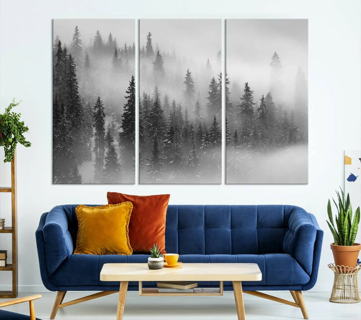 The living room showcases the Foggy Misty Forest Canvas Wall Art in black and white, presented as a triptych on the wall.