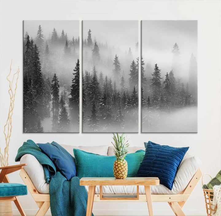 The living room showcases the Foggy Misty Forest Canvas Wall Art in black and white, presented as a triptych on the wall.