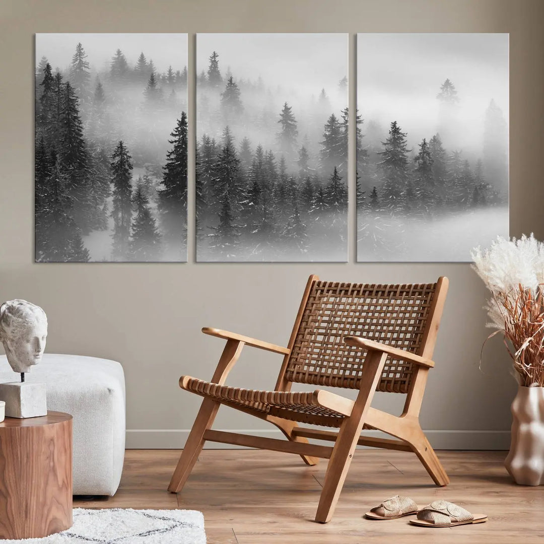 The living room showcases the Foggy Misty Forest Canvas Wall Art in black and white, presented as a triptych on the wall.