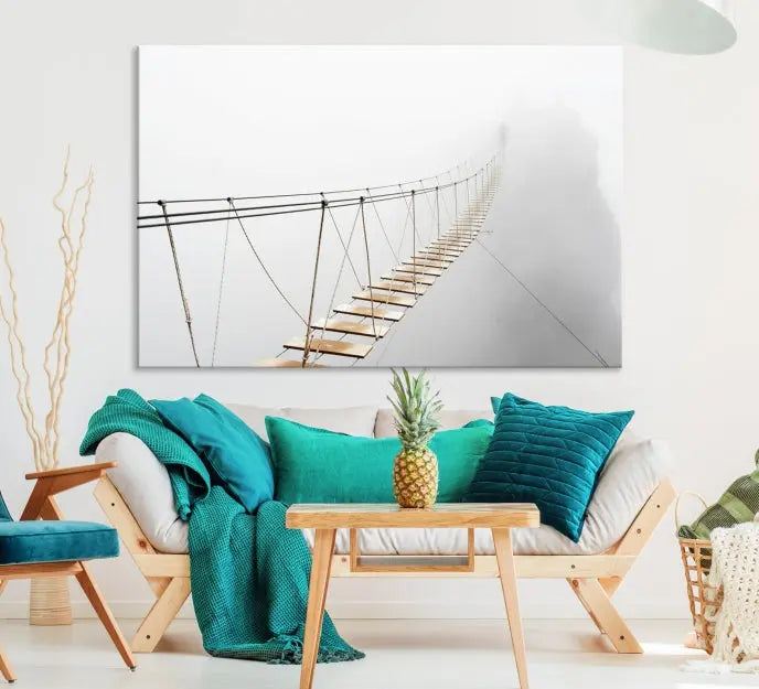 The Foggy and Wood Bridge Wall Art Canvas Print, with its UV-protective coating, elegantly adorns the living room wall. This museum-quality canvas depicting a foggy skywalk bridge exudes a captivating allure that remains timeless.