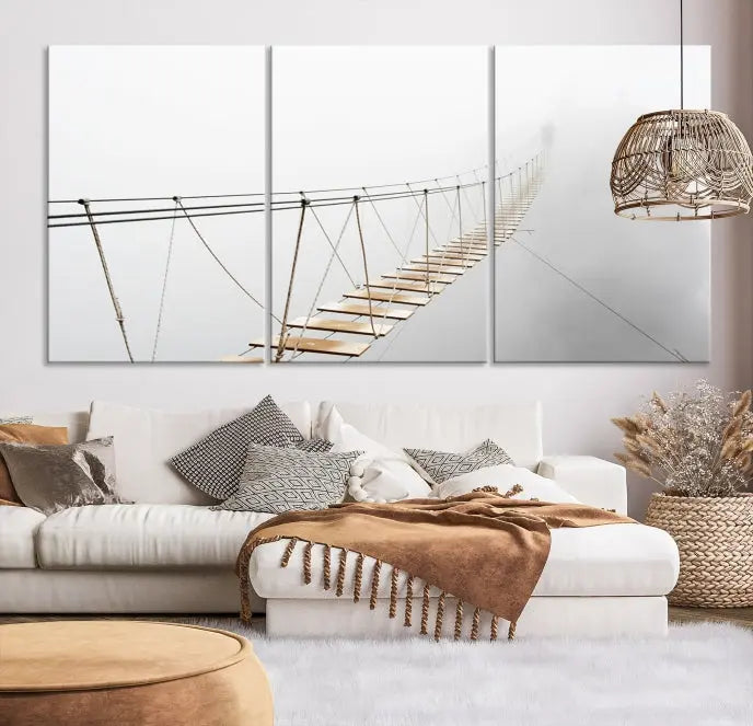 The Foggy and Wood Bridge Wall Art Canvas Print, with its UV-protective coating, elegantly adorns the living room wall. This museum-quality canvas depicting a foggy skywalk bridge exudes a captivating allure that remains timeless.