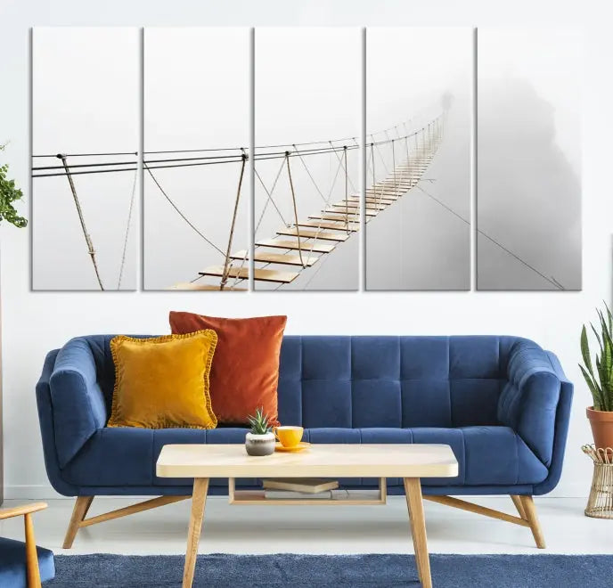 The Foggy and Wood Bridge Wall Art Canvas Print, with its UV-protective coating, elegantly adorns the living room wall. This museum-quality canvas depicting a foggy skywalk bridge exudes a captivating allure that remains timeless.