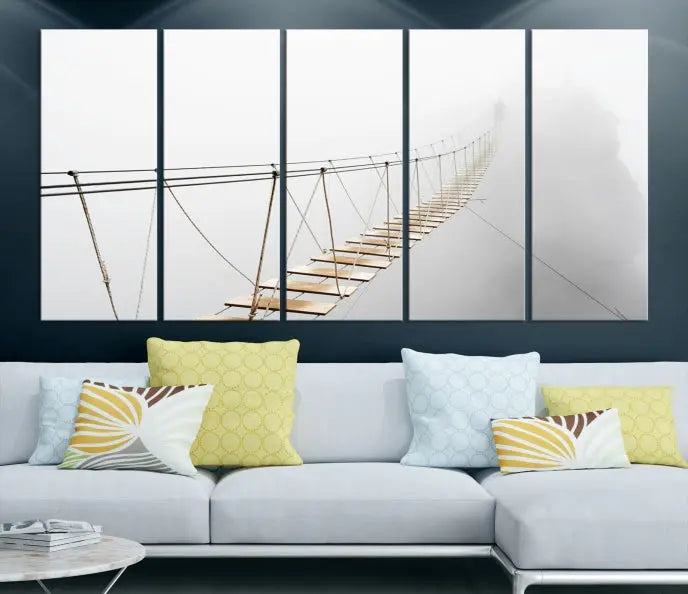 The Foggy and Wood Bridge Wall Art Canvas Print, with its UV-protective coating, elegantly adorns the living room wall. This museum-quality canvas depicting a foggy skywalk bridge exudes a captivating allure that remains timeless.