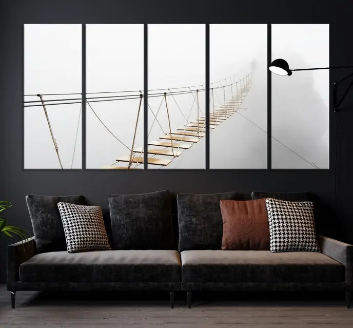 The Foggy and Wood Bridge Wall Art Canvas Print, with its UV-protective coating, elegantly adorns the living room wall. This museum-quality canvas depicting a foggy skywalk bridge exudes a captivating allure that remains timeless.