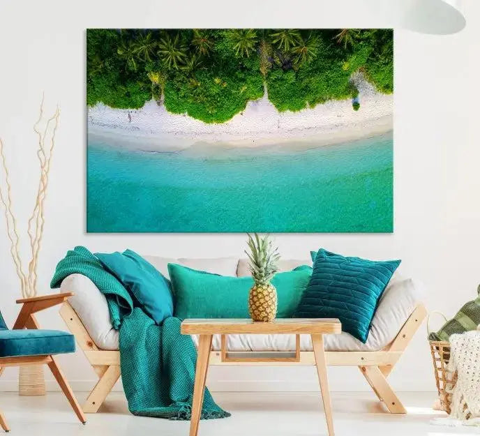 The Forest and Aerial Ocean Wall Art Canvas Print depicts a tropical beach scene, showcasing turquoise waters, white sand, and lush green trees. This triptych is gallery wrapped on museum-quality canvas and features a UV-protective coating to maintain its vibrant colors.