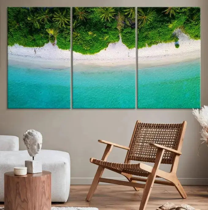 The Forest and Aerial Ocean Wall Art Canvas Print depicts a tropical beach scene, showcasing turquoise waters, white sand, and lush green trees. This triptych is gallery wrapped on museum-quality canvas and features a UV-protective coating to maintain its vibrant colors.