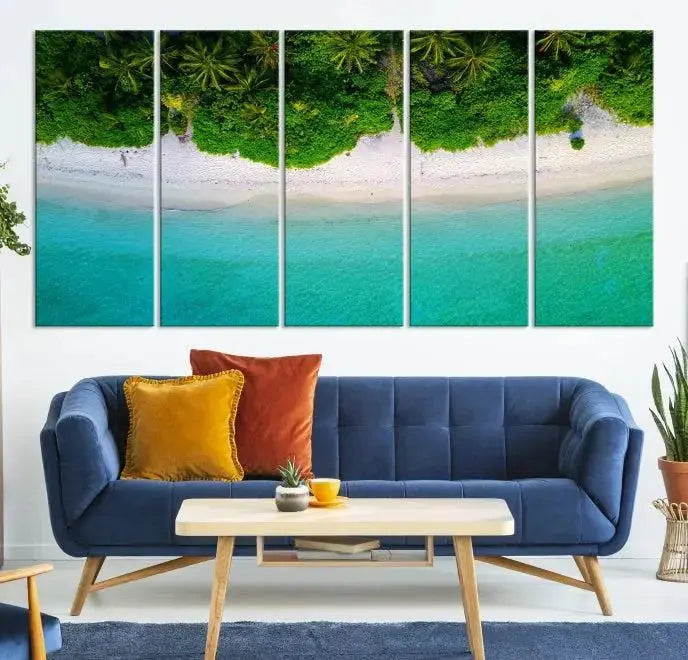 The Forest and Aerial Ocean Wall Art Canvas Print depicts a tropical beach scene, showcasing turquoise waters, white sand, and lush green trees. This triptych is gallery wrapped on museum-quality canvas and features a UV-protective coating to maintain its vibrant colors.