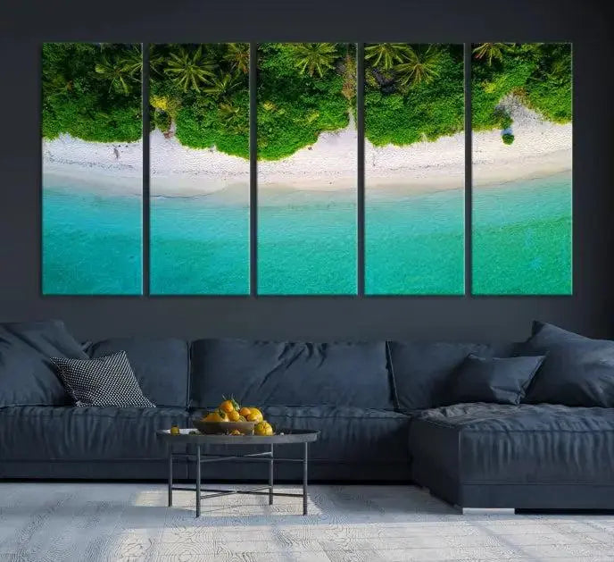 The Forest and Aerial Ocean Wall Art Canvas Print depicts a tropical beach scene, showcasing turquoise waters, white sand, and lush green trees. This triptych is gallery wrapped on museum-quality canvas and features a UV-protective coating to maintain its vibrant colors.