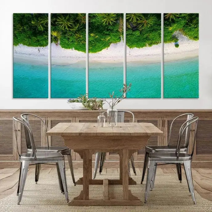 The Forest and Aerial Ocean Wall Art Canvas Print depicts a tropical beach scene, showcasing turquoise waters, white sand, and lush green trees. This triptych is gallery wrapped on museum-quality canvas and features a UV-protective coating to maintain its vibrant colors.