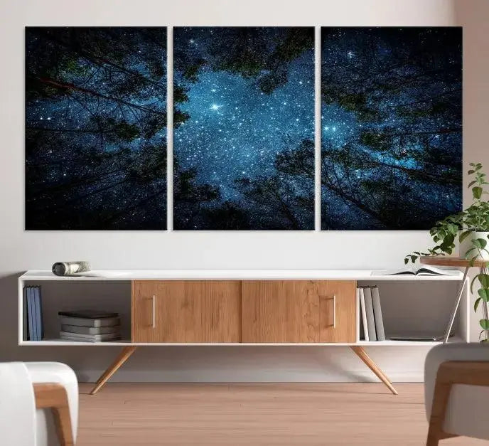 The wall showcases the "Forest and Stars" Wall Art Canvas Print on museum-quality canvas with a UV-protective coating, adding an artistic touch to the space.