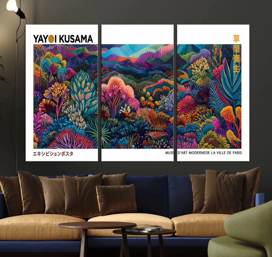 A set of three vibrant abstract landscape canvas prints, inspired by Yayoi Kusama's style and capturing a Japanese Wabi Sabi aesthetic, adorns the dark wall, creating a stunning piece of contemporary décor.