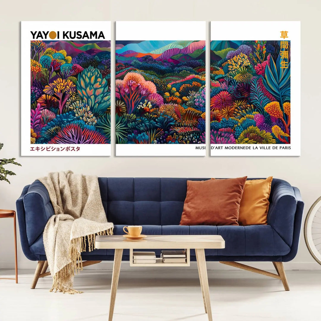 A set of three vibrant abstract landscape canvas prints, inspired by Yayoi Kusama's style and capturing a Japanese Wabi Sabi aesthetic, adorns the dark wall, creating a stunning piece of contemporary décor.