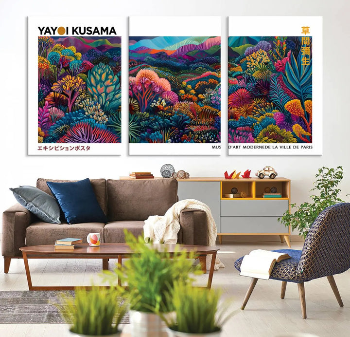 A set of three vibrant abstract landscape canvas prints, inspired by Yayoi Kusama's style and capturing a Japanese Wabi Sabi aesthetic, adorns the dark wall, creating a stunning piece of contemporary décor.