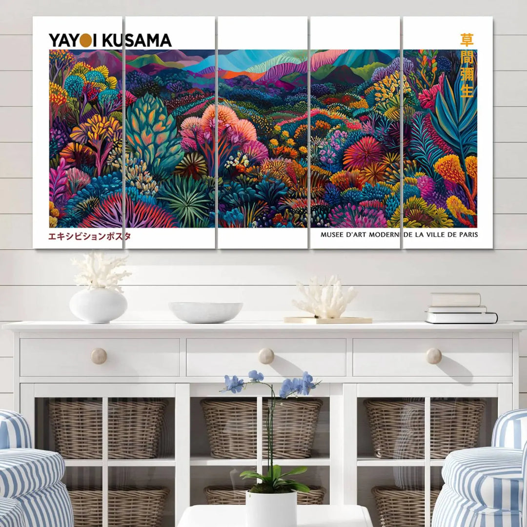 A set of three vibrant abstract landscape canvas prints, inspired by Yayoi Kusama's style and capturing a Japanese Wabi Sabi aesthetic, adorns the dark wall, creating a stunning piece of contemporary décor.