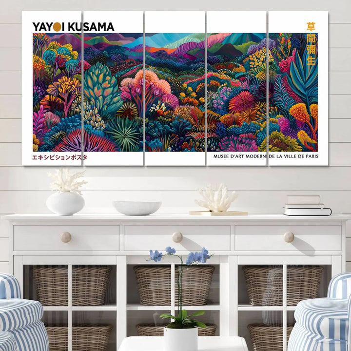 A set of three vibrant abstract landscape canvas prints, inspired by Yayoi Kusama's style and capturing a Japanese Wabi Sabi aesthetic, adorns the dark wall, creating a stunning piece of contemporary décor.