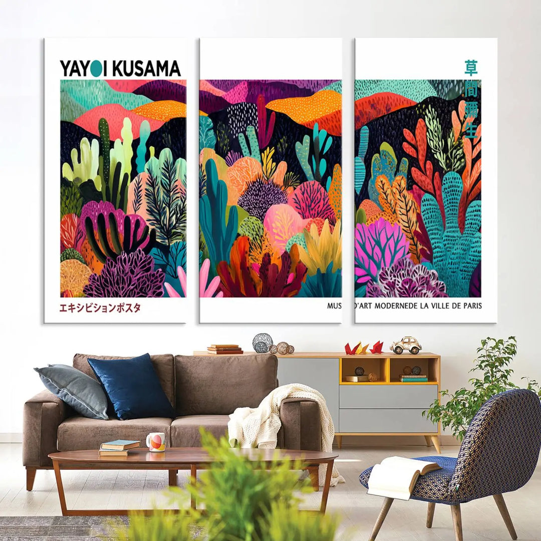 A cozy living room features colorful wall art, with the Framed Yayoi Kusama 1986 Wall Art Print taking center stage. This vibrant abstract landscape canvas seamlessly blends with the contemporary décor, creating a lively yet harmonious atmosphere.