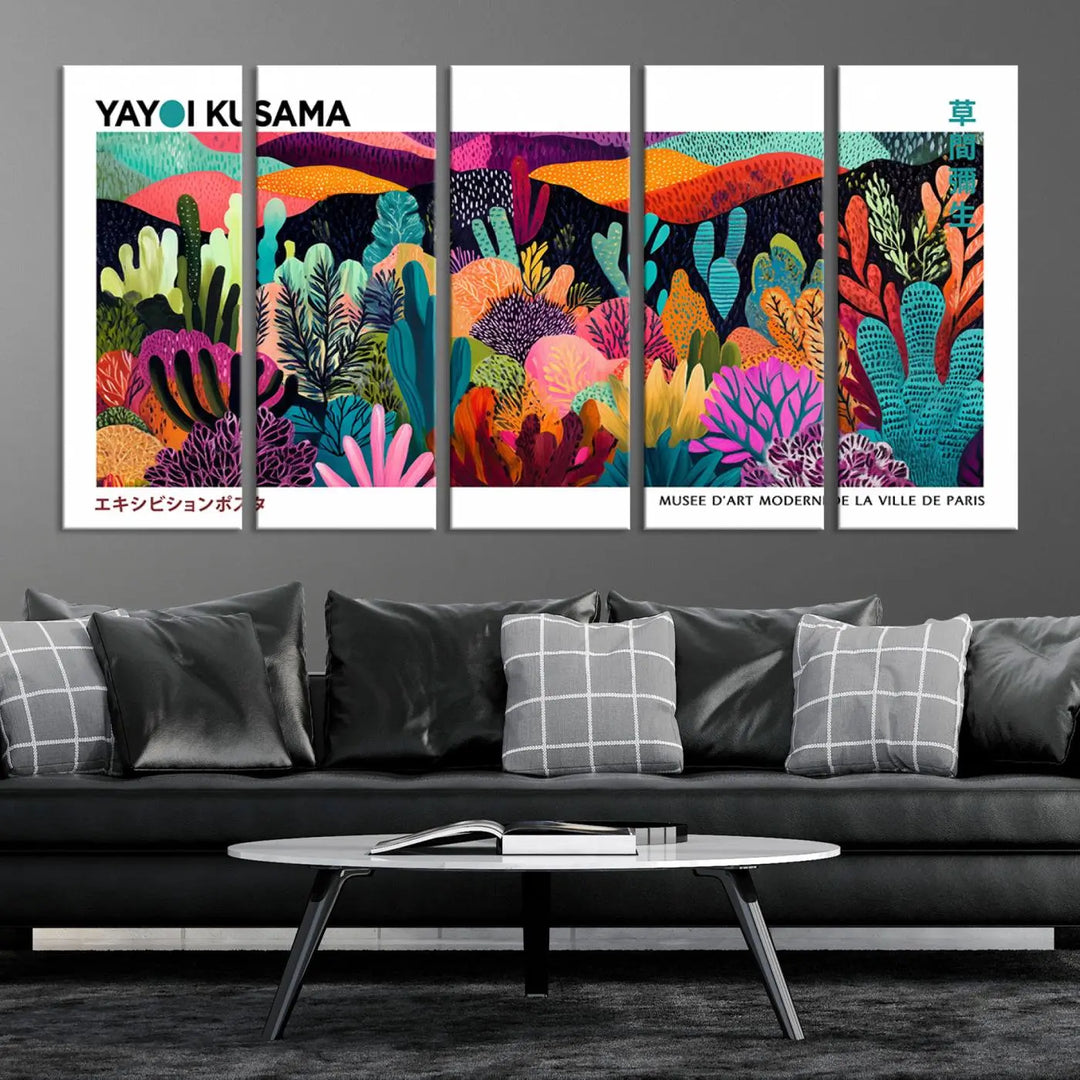 A cozy living room features colorful wall art, with the Framed Yayoi Kusama 1986 Wall Art Print taking center stage. This vibrant abstract landscape canvas seamlessly blends with the contemporary décor, creating a lively yet harmonious atmosphere.