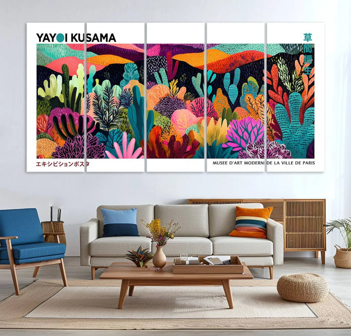 A cozy living room features colorful wall art, with the Framed Yayoi Kusama 1986 Wall Art Print taking center stage. This vibrant abstract landscape canvas seamlessly blends with the contemporary décor, creating a lively yet harmonious atmosphere.