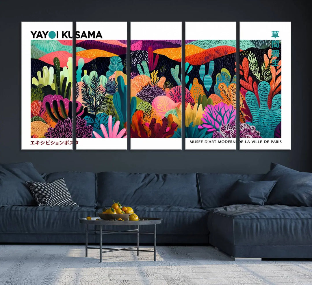 A cozy living room features colorful wall art, with the Framed Yayoi Kusama 1986 Wall Art Print taking center stage. This vibrant abstract landscape canvas seamlessly blends with the contemporary décor, creating a lively yet harmonious atmosphere.