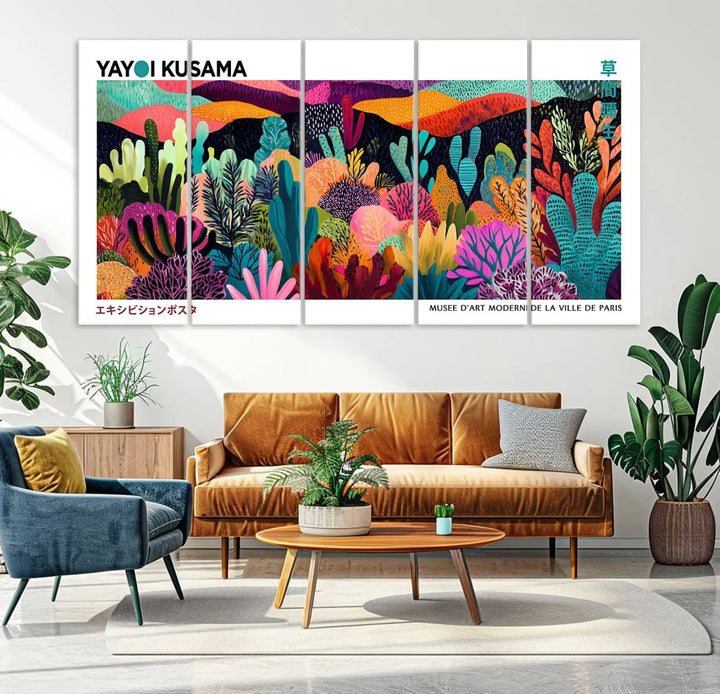 A cozy living room features colorful wall art, with the Framed Yayoi Kusama 1986 Wall Art Print taking center stage. This vibrant abstract landscape canvas seamlessly blends with the contemporary décor, creating a lively yet harmonious atmosphere.