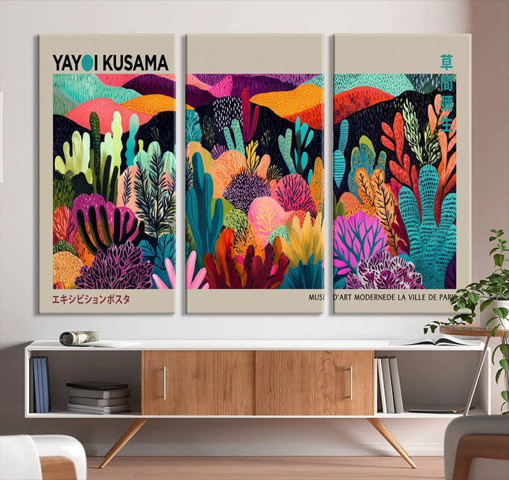 The Framed Yayoi Kusama 1986 Wall Art Print serves as a contemporary, nature-inspired décor piece, displaying colorful plant-like forms.