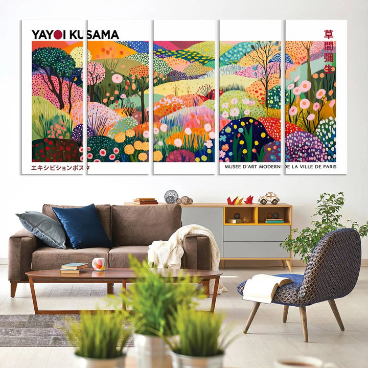 Three vibrant, abstract Yayoi Kusama wall art prints adorn a black wall, creating a perfect blend of contemporary décor.