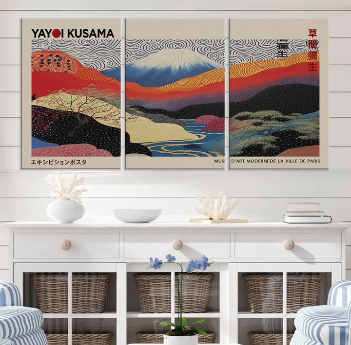 A framed Yayoi Kusama 1986 wall art print, showcasing vibrant abstract landscapes with a Wabi Sabi influence, is prominently displayed as a Japanese wall art piece.