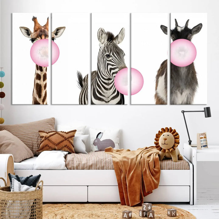 The "Funny Animals Canvas Wall Art Goat Zebra Giraffe Canvas Print" features a giraffe, zebra, and goat blowing pink bubblegum on museum-quality canvas, adding a playful touch to the space.