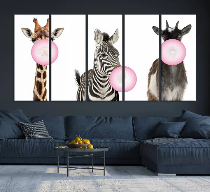 The "Funny Animals Canvas Wall Art Goat Zebra Giraffe Canvas Print" features a giraffe, zebra, and goat blowing pink bubblegum on museum-quality canvas, adding a playful touch to the space.