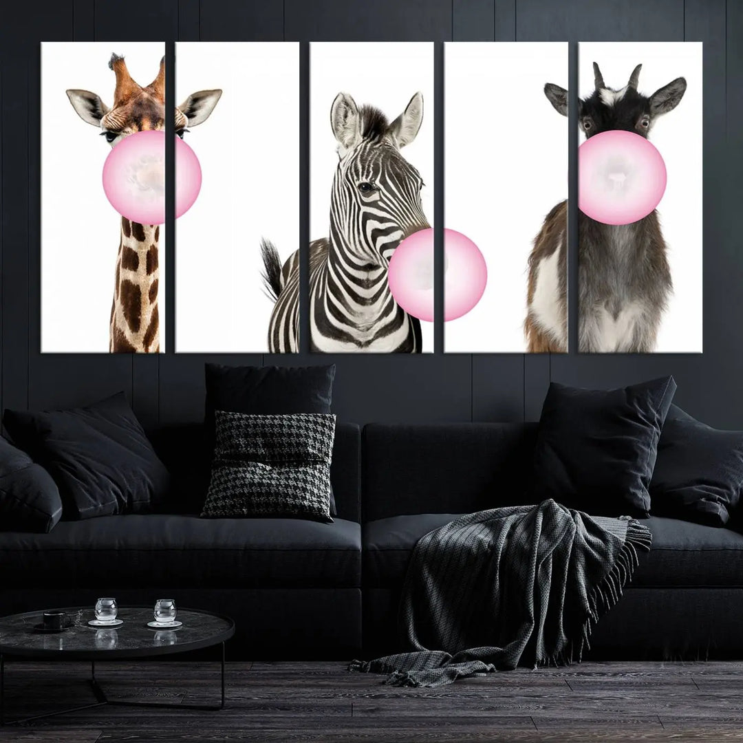 The "Funny Animals Canvas Wall Art Goat Zebra Giraffe Canvas Print" features a giraffe, zebra, and goat blowing pink bubblegum on museum-quality canvas, adding a playful touch to the space.