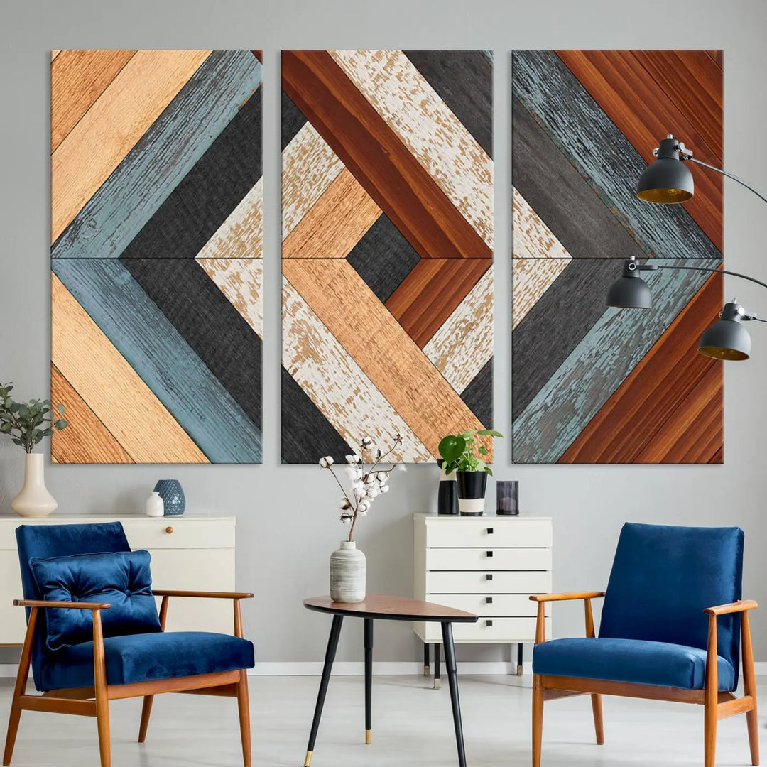 Above the blue sofa hangs the Geometric Wood Art Wall Decor Canvas Print, Rustic Wooden Pattern Triptych Wall Art for Living Room – Ready to Hang. This piece adds rustic charm to the space with its unique wall decor.