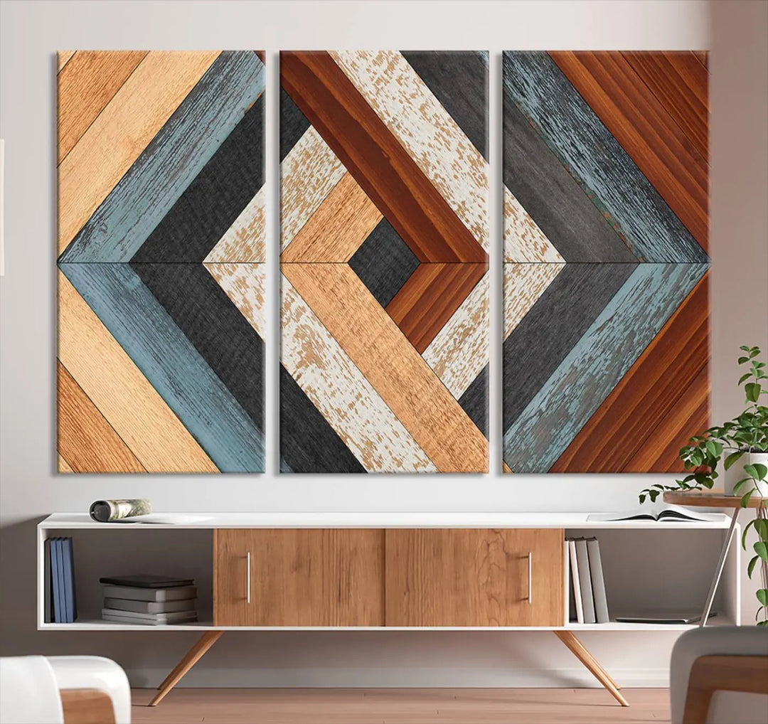 Above the blue sofa hangs the Geometric Wood Art Wall Decor Canvas Print, Rustic Wooden Pattern Triptych Wall Art for Living Room – Ready to Hang. This piece adds rustic charm to the space with its unique wall decor.