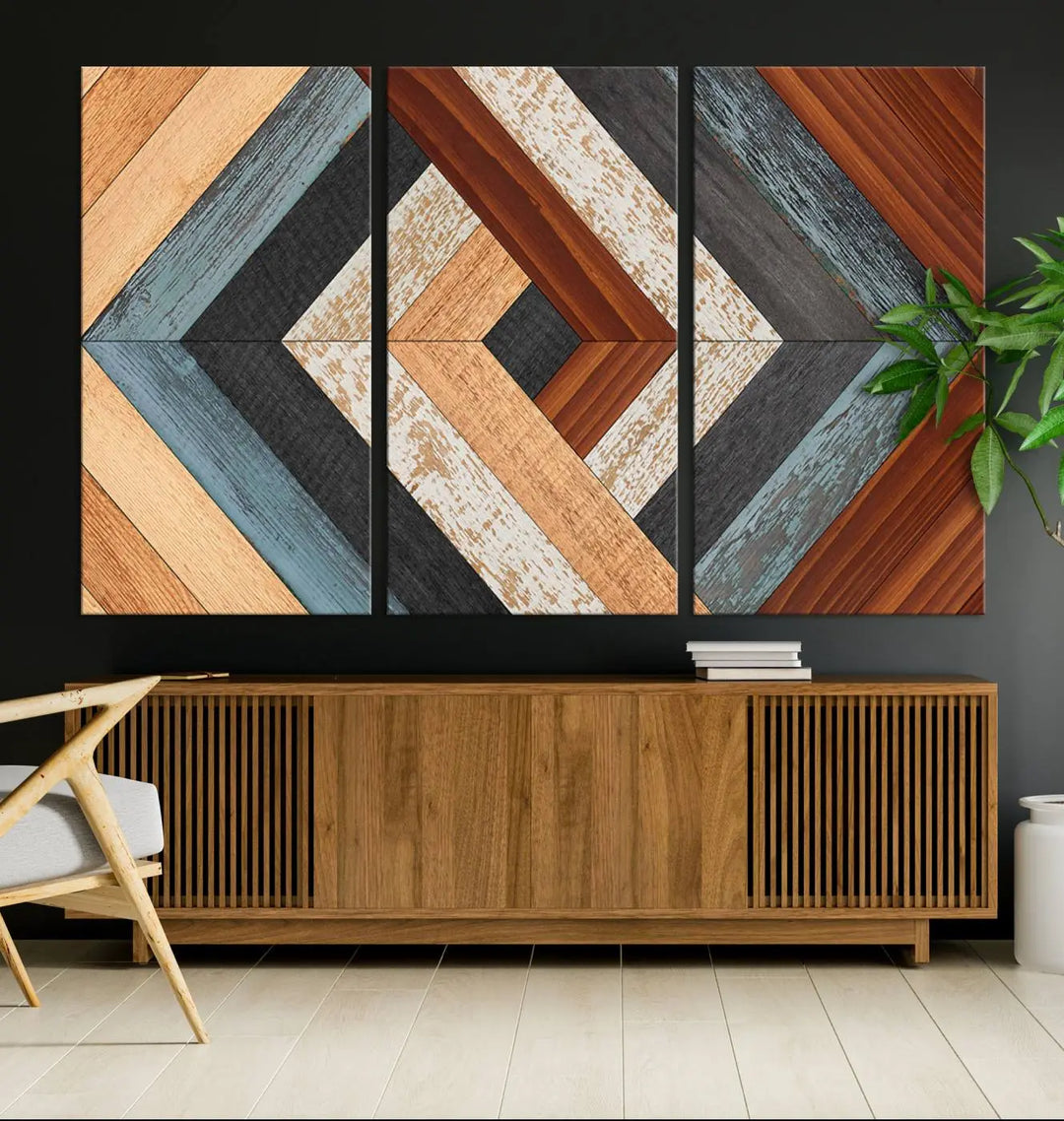 Above the blue sofa hangs the Geometric Wood Art Wall Decor Canvas Print, Rustic Wooden Pattern Triptych Wall Art for Living Room – Ready to Hang. This piece adds rustic charm to the space with its unique wall decor.