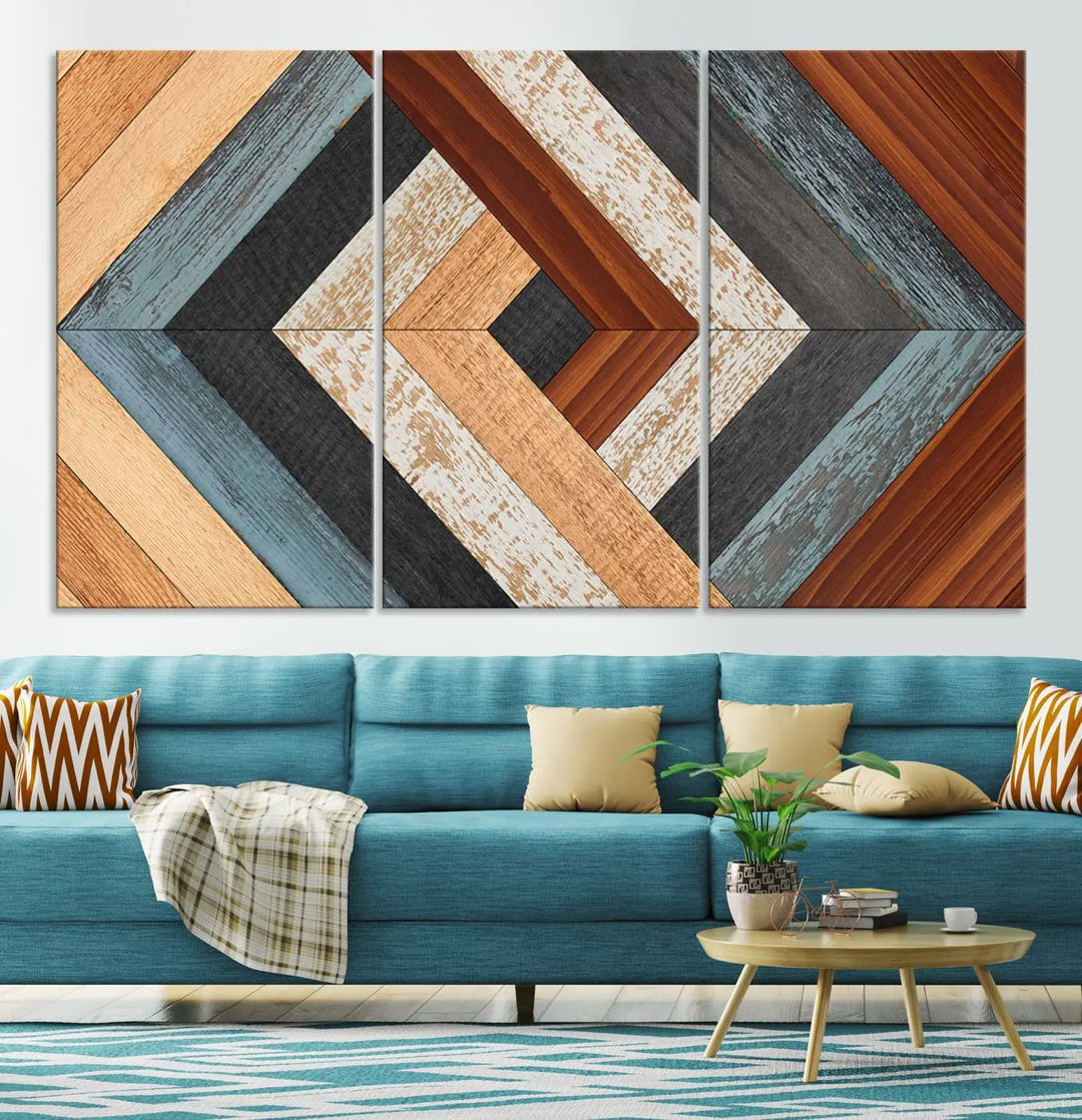 Above the blue sofa hangs the Geometric Wood Art Wall Decor Canvas Print, Rustic Wooden Pattern Triptych Wall Art for Living Room – Ready to Hang. This piece adds rustic charm to the space with its unique wall decor.