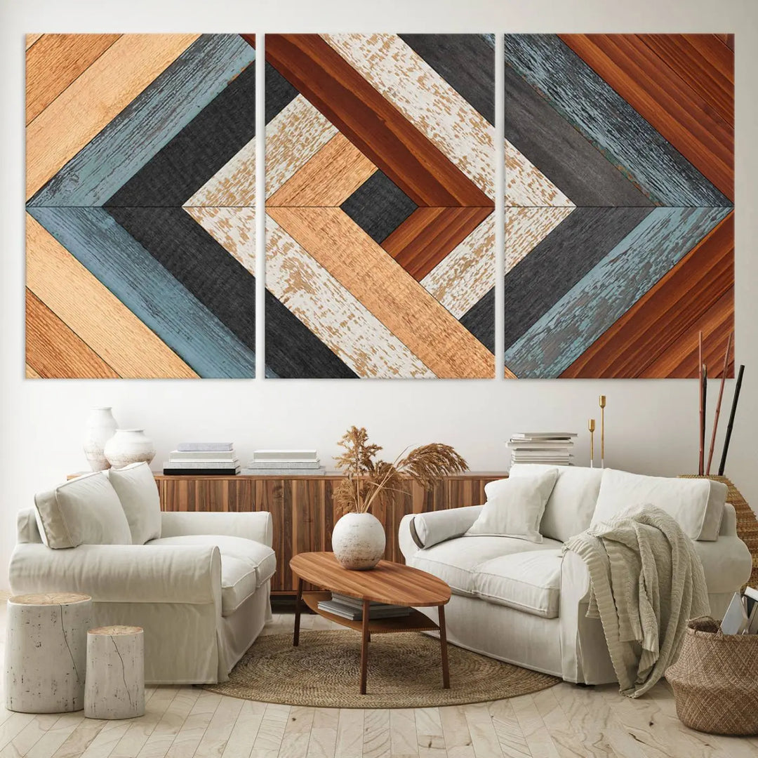 Above the blue sofa hangs the Geometric Wood Art Wall Decor Canvas Print, Rustic Wooden Pattern Triptych Wall Art for Living Room – Ready to Hang. This piece adds rustic charm to the space with its unique wall decor.