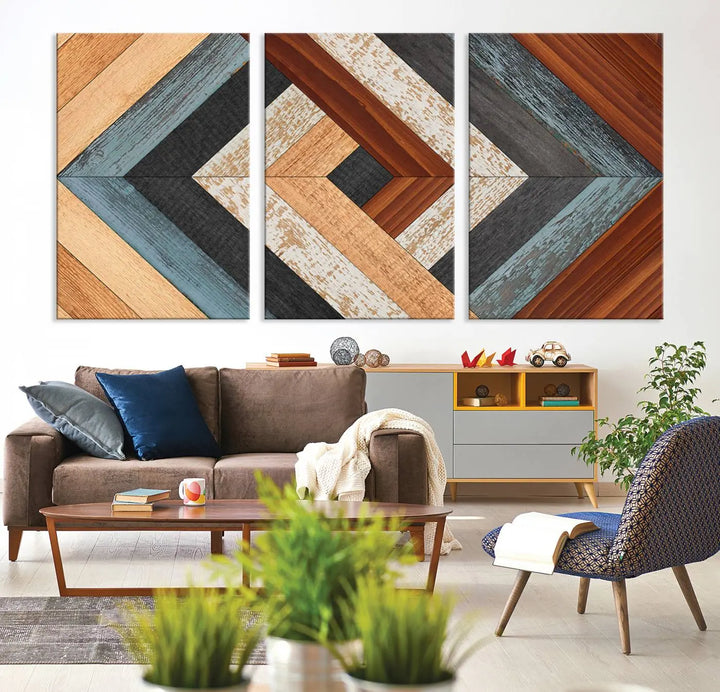 Above the blue sofa hangs the Geometric Wood Art Wall Decor Canvas Print, Rustic Wooden Pattern Triptych Wall Art for Living Room – Ready to Hang. This piece adds rustic charm to the space with its unique wall decor.