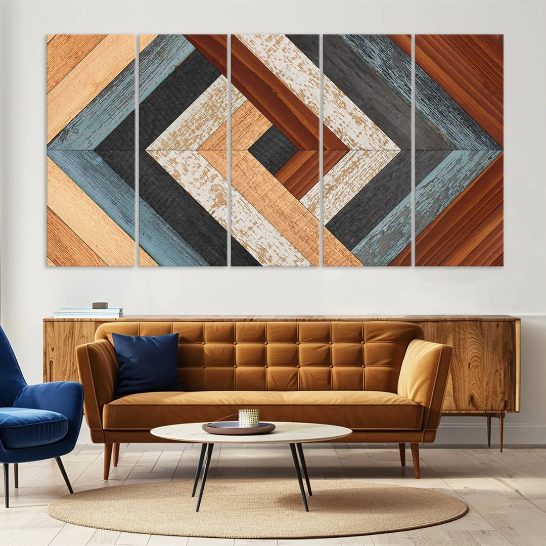 Above the blue sofa hangs the Geometric Wood Art Wall Decor Canvas Print, Rustic Wooden Pattern Triptych Wall Art for Living Room – Ready to Hang. This piece adds rustic charm to the space with its unique wall decor.