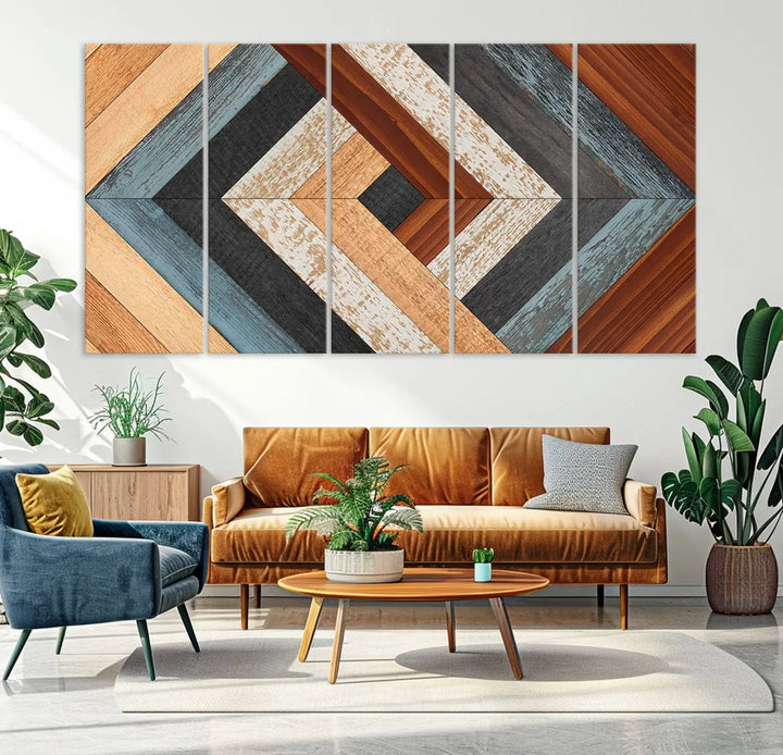 Above the blue sofa hangs the Geometric Wood Art Wall Decor Canvas Print, Rustic Wooden Pattern Triptych Wall Art for Living Room – Ready to Hang. This piece adds rustic charm to the space with its unique wall decor.