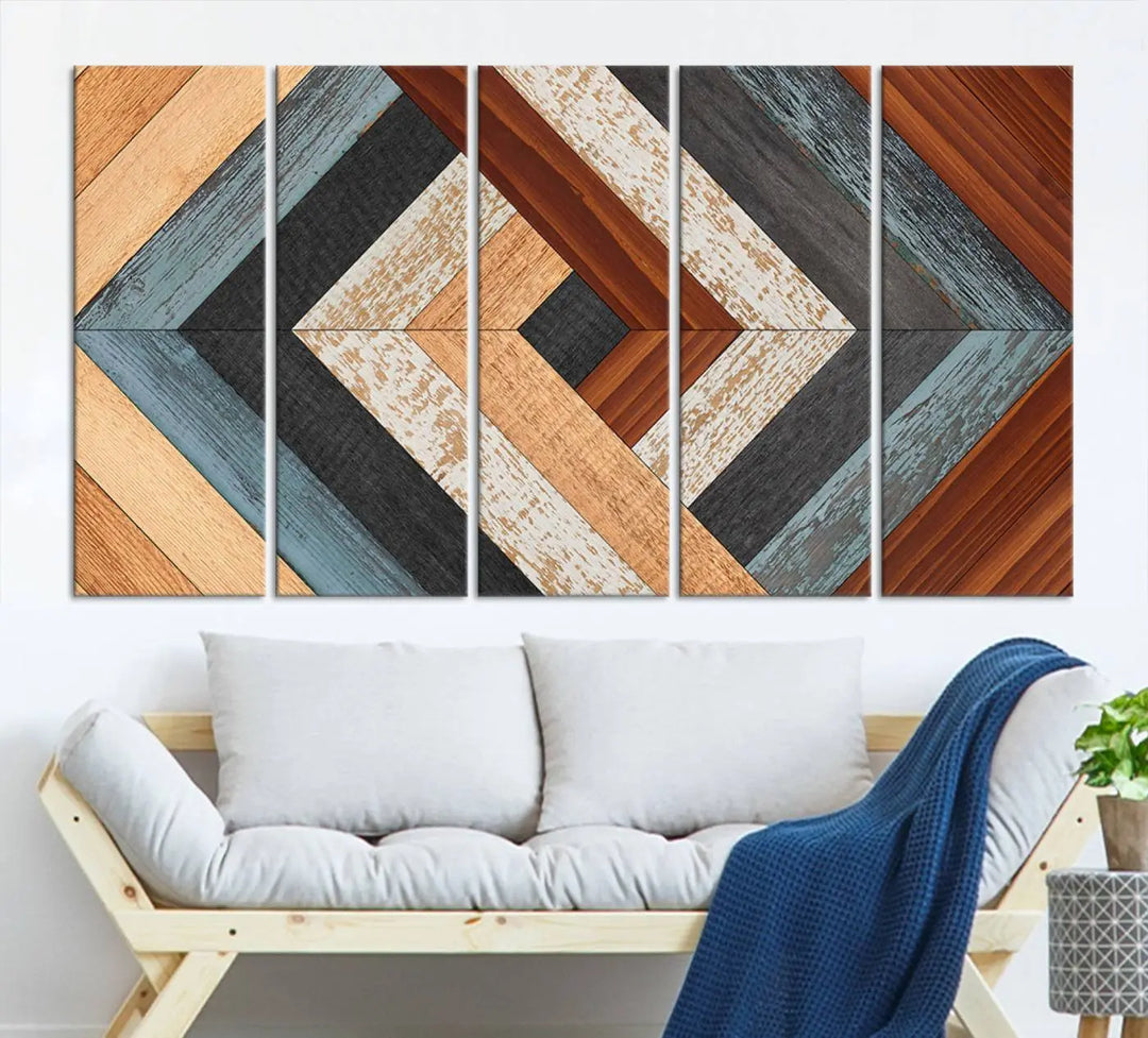 Above the blue sofa hangs the Geometric Wood Art Wall Decor Canvas Print, Rustic Wooden Pattern Triptych Wall Art for Living Room – Ready to Hang. This piece adds rustic charm to the space with its unique wall decor.