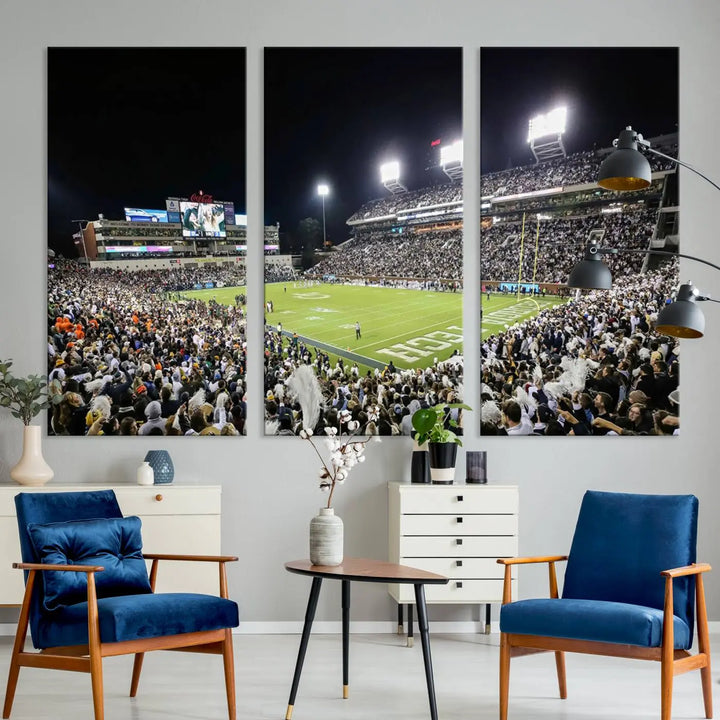 Showcased as premium wall art, this gallery-quality canvas features a print of the Georgia Tech Yellow Jackets Football Team at Atlanta's Bobby Dodd Stadium during a crowded, illuminated night game.