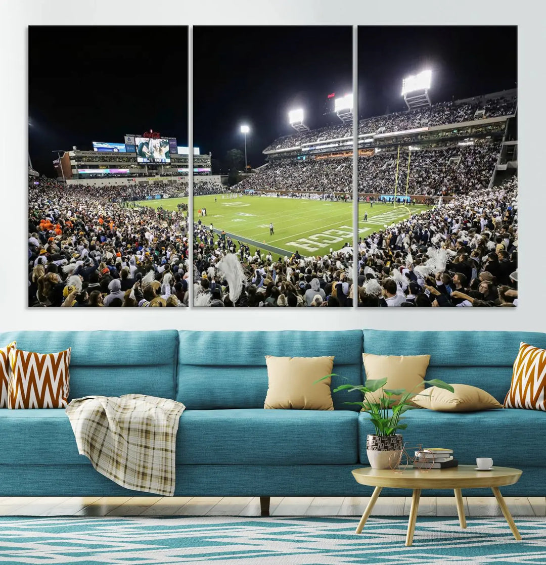 Showcased as premium wall art, this gallery-quality canvas features a print of the Georgia Tech Yellow Jackets Football Team at Atlanta's Bobby Dodd Stadium during a crowded, illuminated night game.