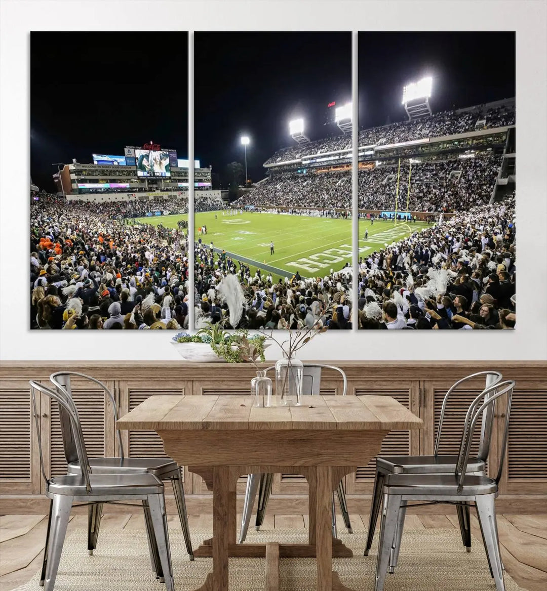 Showcased as premium wall art, this gallery-quality canvas features a print of the Georgia Tech Yellow Jackets Football Team at Atlanta's Bobby Dodd Stadium during a crowded, illuminated night game.