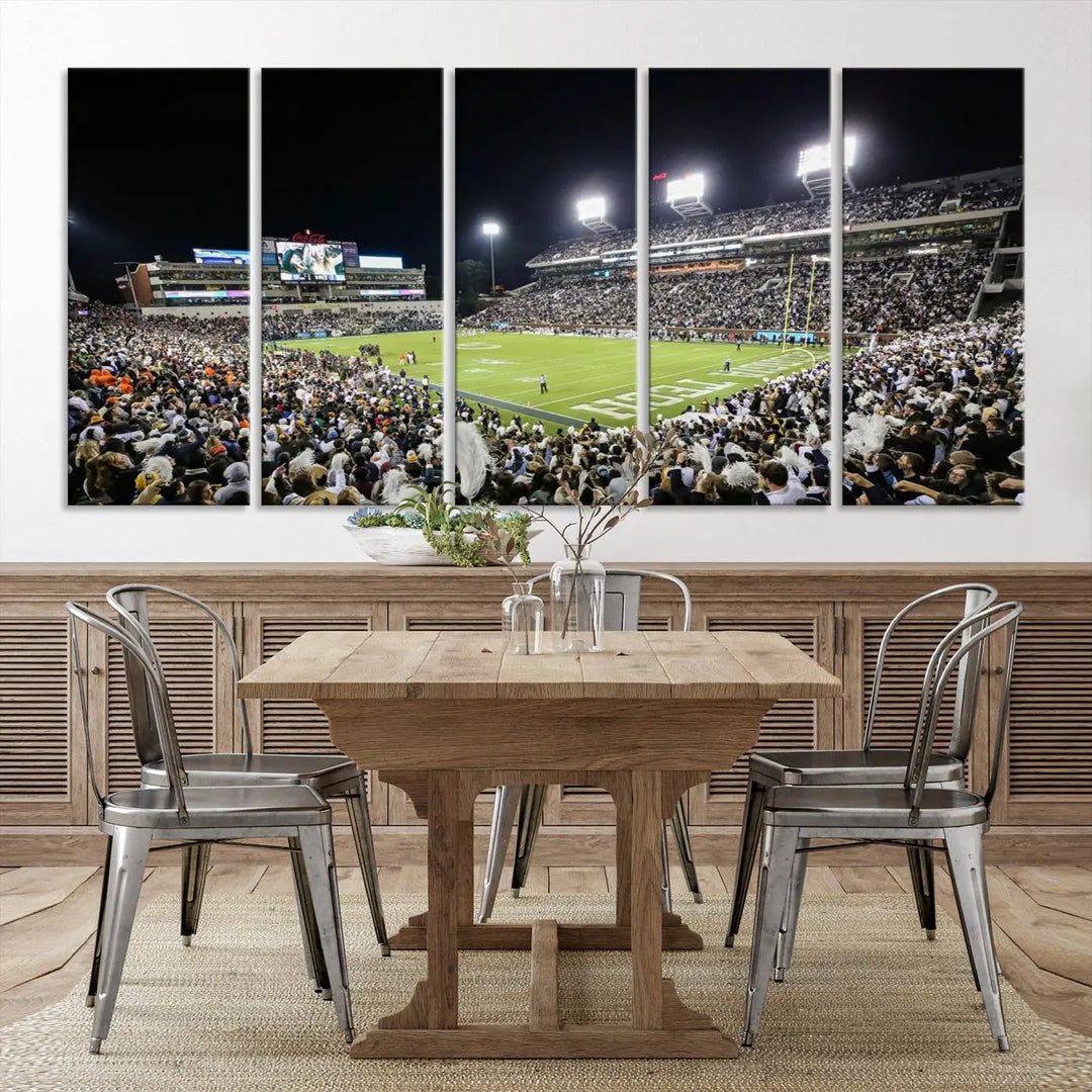 Showcased as premium wall art, this gallery-quality canvas features a print of the Georgia Tech Yellow Jackets Football Team at Atlanta's Bobby Dodd Stadium during a crowded, illuminated night game.